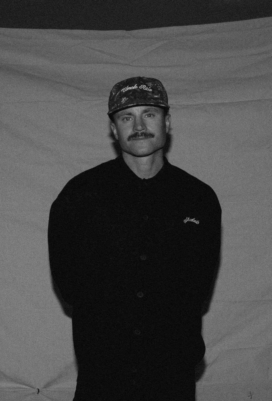 Black and white portrait of director Bradley Dunn.